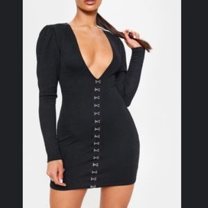 LBD Hook and eye detail with puff sleeve